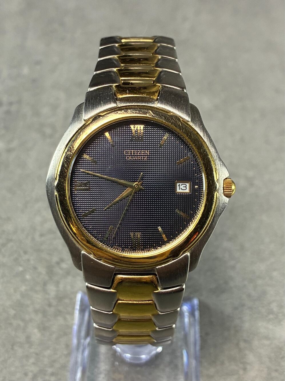 Citizen Quartz 1989 Men's Two-Tone Watch Black Textured Dial 36mm Works